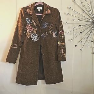 Tan brownish designer jacket made by Newport News Smalls to medium size